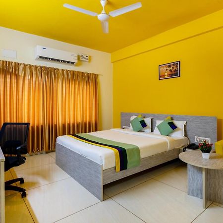 Treebo Four Seasons Hotel Mysore Bagian luar foto
